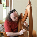 Kevin Kinney with harp